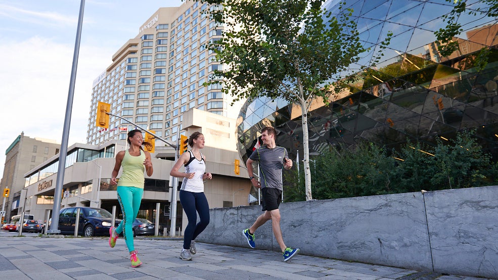 Runners along Rideau Canal and Shaw Centre