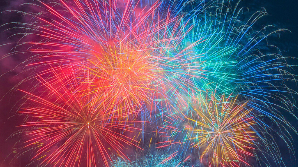 multicolour fireworks exploding on a black sky