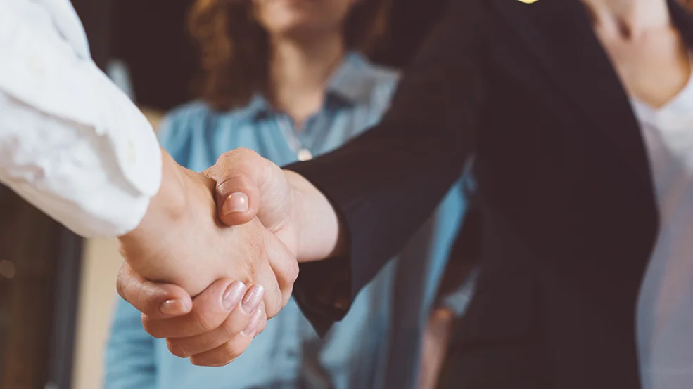 Business people shaking hands