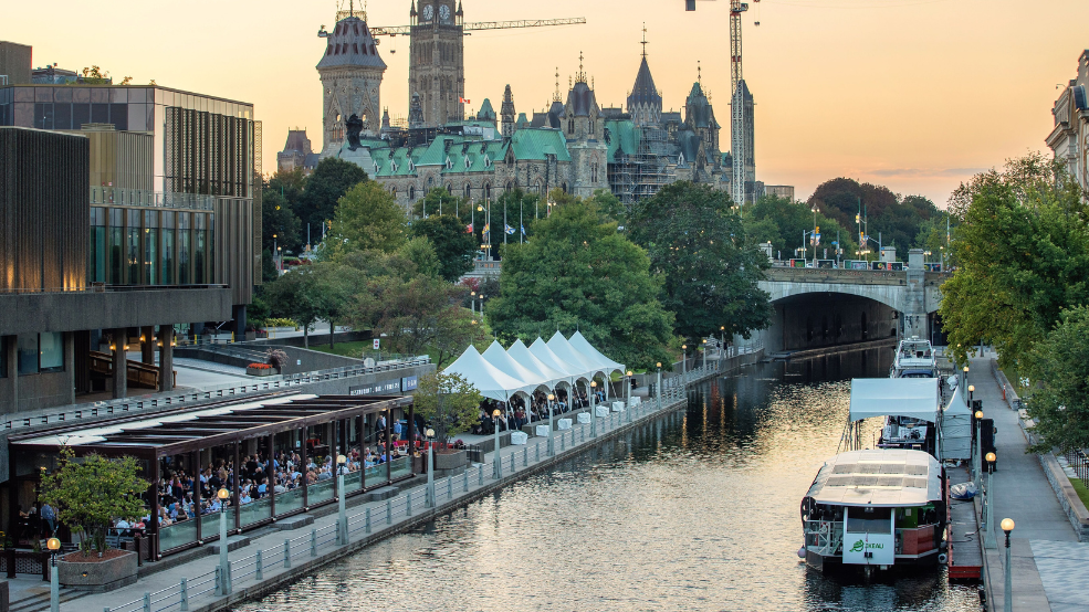 A bustling restaurant alongside of the Rideau Canal.