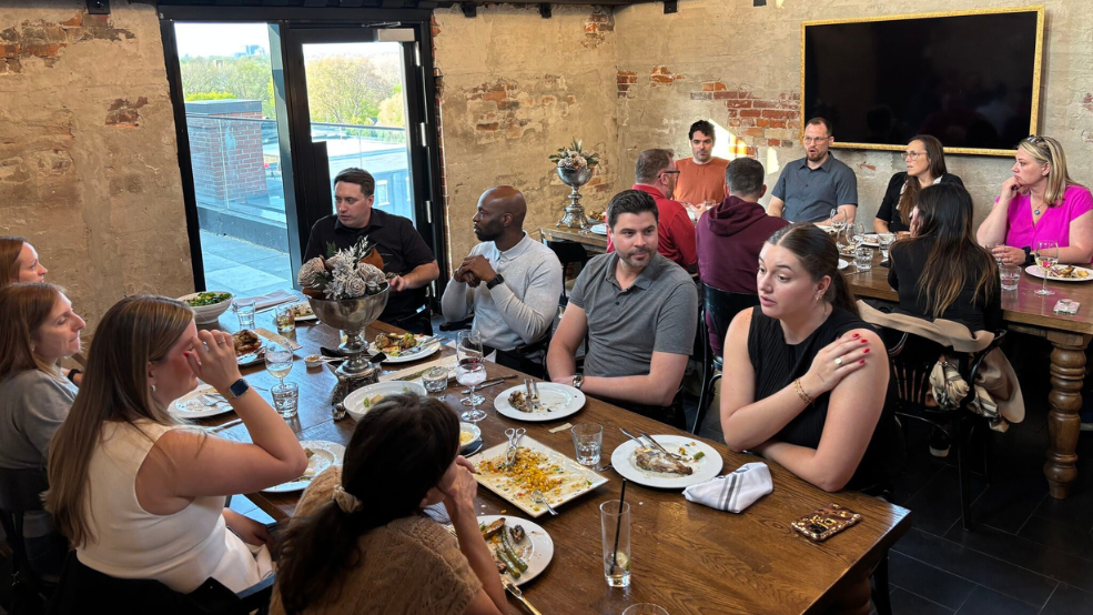 Ottawa Tourism team and clients dine at restaurant