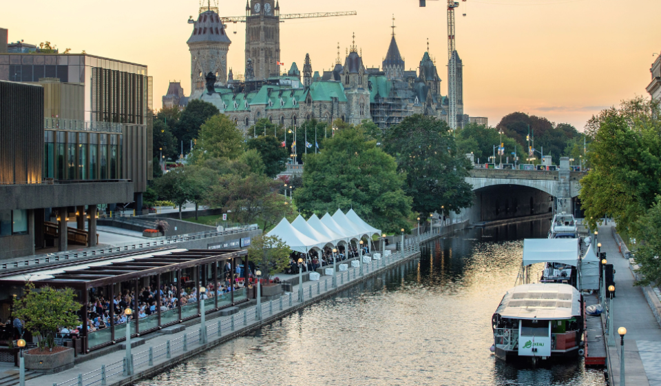A bustling restaurant alongside of the Rideau Canal.