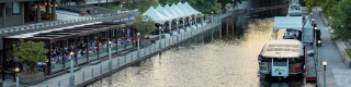 A bustling restaurant alongside of the Rideau Canal.